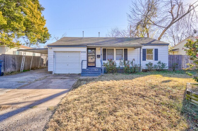 Building Photo - Stylish Home with Covered Deck & Easy I-44...