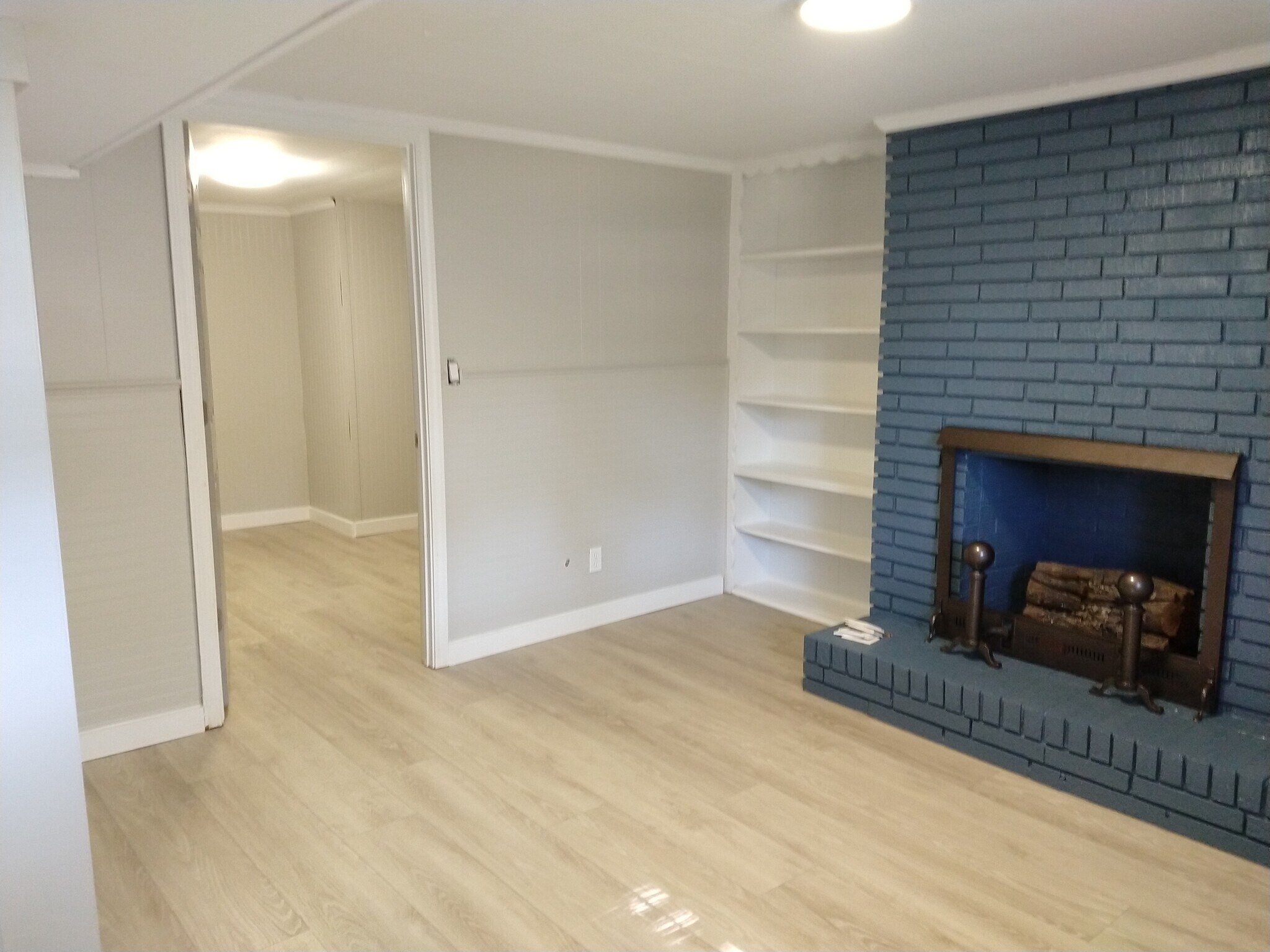 Fhamily room with faux fireplace - 6457 Peacock Blvd