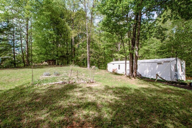 Building Photo - 7967 Caswell Rd