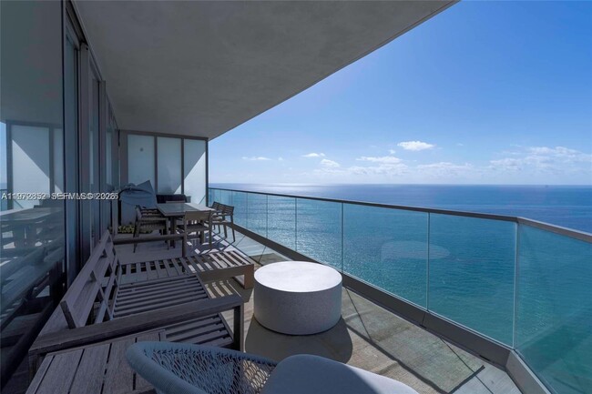 Building Photo - 18975 Collins Ave