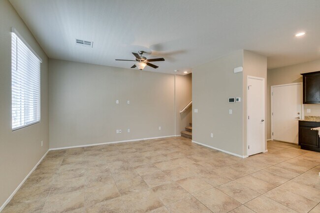 Building Photo - Spacious Townhouse with Loft & Rare 3-Car Garage!