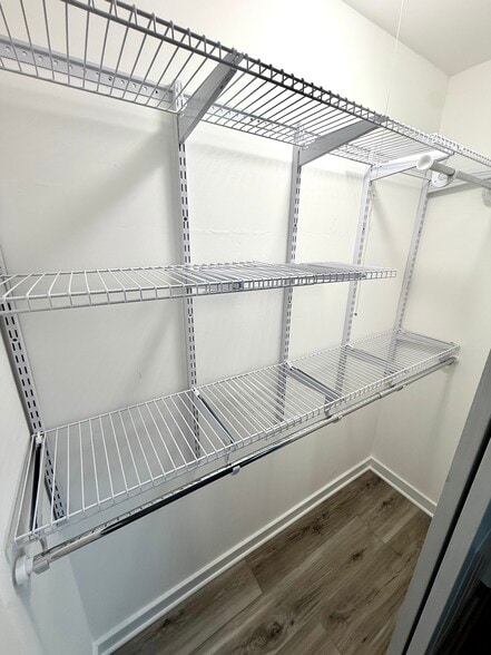 Modern modular ClosetMaid closet systems in all bedroom closets. - 16W671 56th St