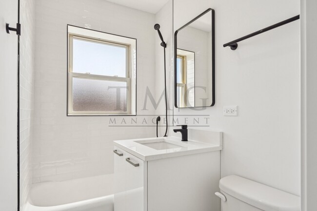 Building Photo - Sleek, Bright & Brand New — Stylish Studio in Andersonville