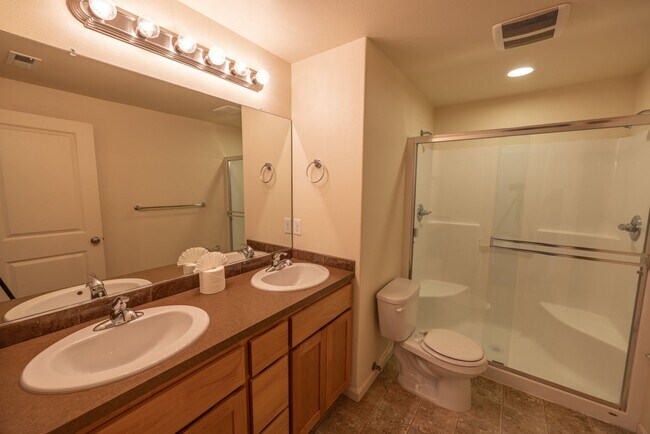 Building Photo - Three bedroom home in Orchards. - Central Air