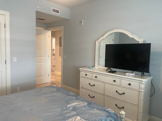 Building Photo - Coastal Luxury at Hidden Bay | 3BR Waterfront Condo with Bay Views