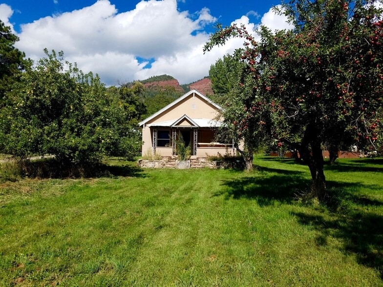 East side with porch and large yard - 7850 Co Rd 203