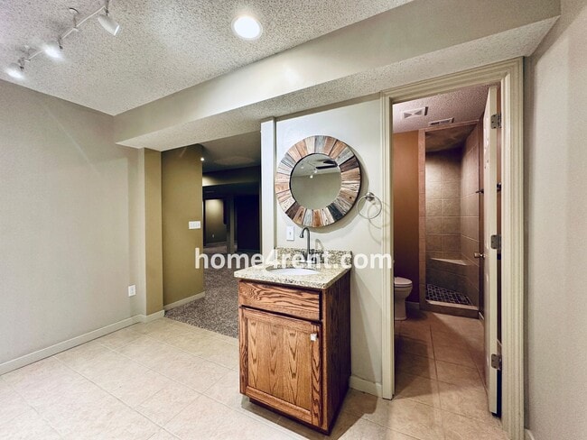 Building Photo - Maintenance Free! Main level Master, Finished Basement and Wood Floors in the Kitchen! *Brand New...