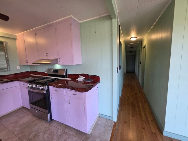 Building Photo - Available July 1 | Flexible 5-Bedroom Layout | 3.5BA Home | Secured Carport