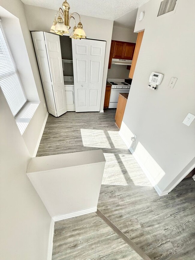 Building Photo - *** RENT READY!! Newly remodeled townhome! ALL Laminate.