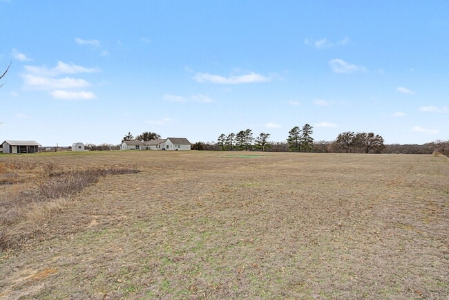 Building Photo - “4-Bedroom, 3-Bath Farmhouse Charm Meets Modern Luxury on a Serene 5-Acre Lot!”