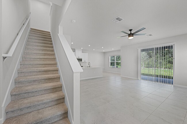 Building Photo - Brand-New 4BR Home with Tile Floors & Quartz Kitchen & Conservation Views