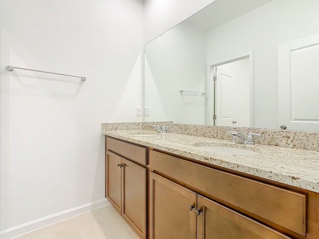 Building Photo - New Luxury Townhome in Celebration, FL Corner unit.  All porcelain tiled floors.  Aleutian model ...