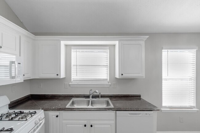 Building Photo - Coming Soon....Spacious 3BR/2.5BA Home in ...