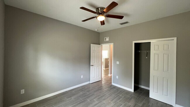 Building Photo - Smart & Stylish 3BD/2BA Palm Bay Home – Modern Upgrades, No Water Bills!