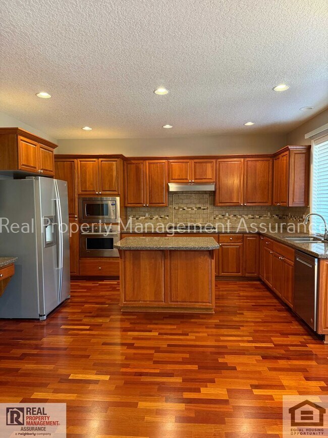 Building Photo - 13611 NW Stonebridge Dr
