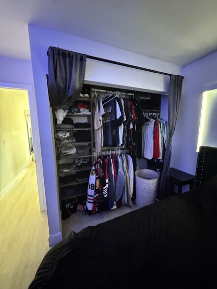 Closet with curtains - 2161 NW 89th Ter
