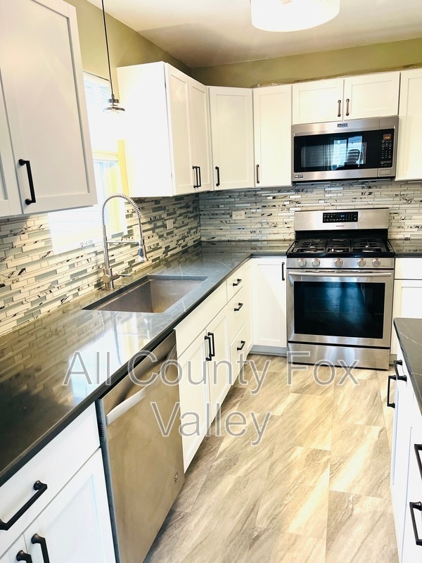 Building Photo - 7160 Center Ave