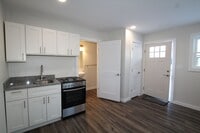 Building Photo - Beautifully remodeled and completed effici...