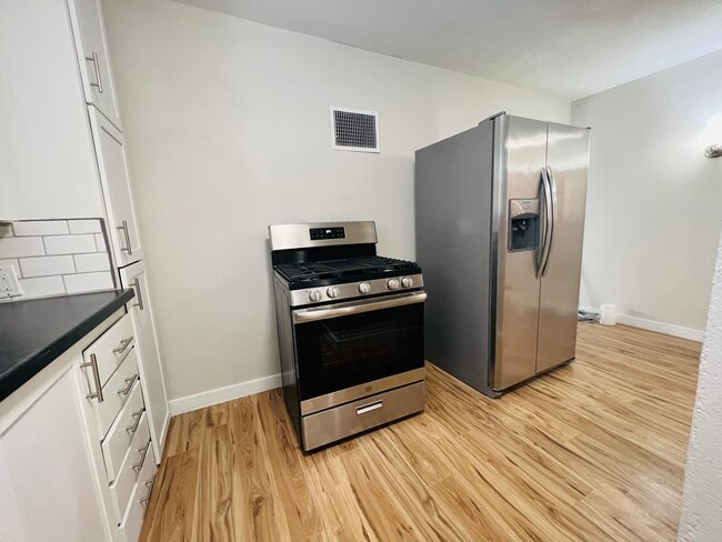 Stainless steel stove/oven and refrigerator - 48 Convis St