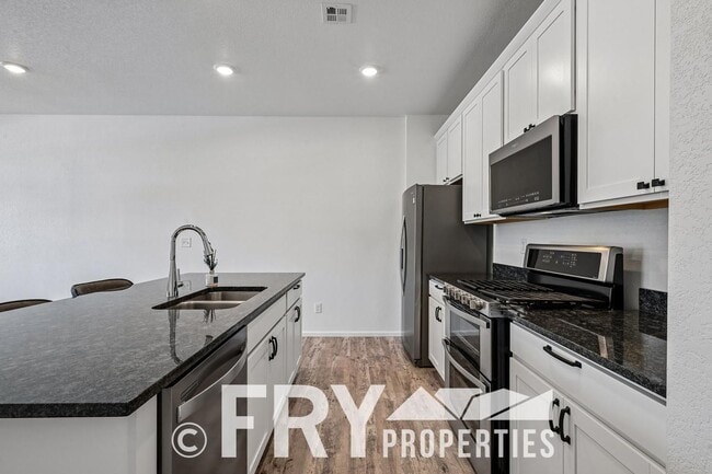 Building Photo - 3BR Home w/ Attached Garage + Easy Commute to Denver & DIA