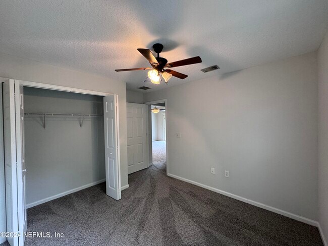 Building Photo - 6985 Ortega Woods Dr