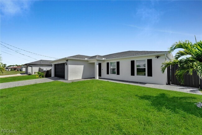 Building Photo - 3095 NW 4th Pl