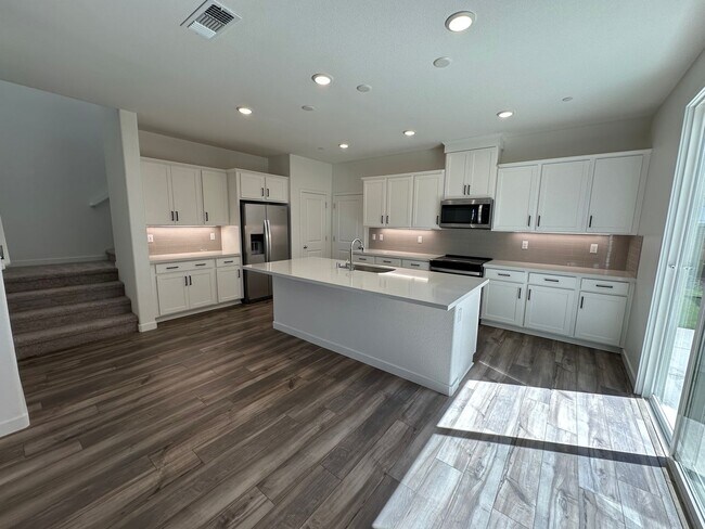 Building Photo - Stunning, Sun-Drenched 4BR + Loft Home in Lakeview – Loaded with Premium Upgrades!