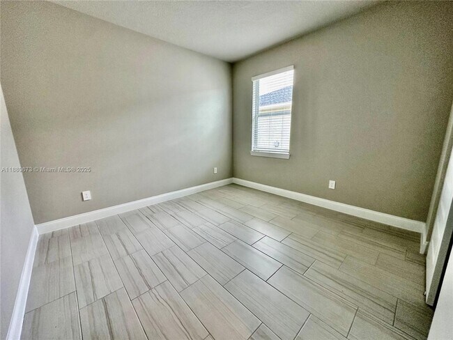 Building Photo - 9035 Dahlia Cir