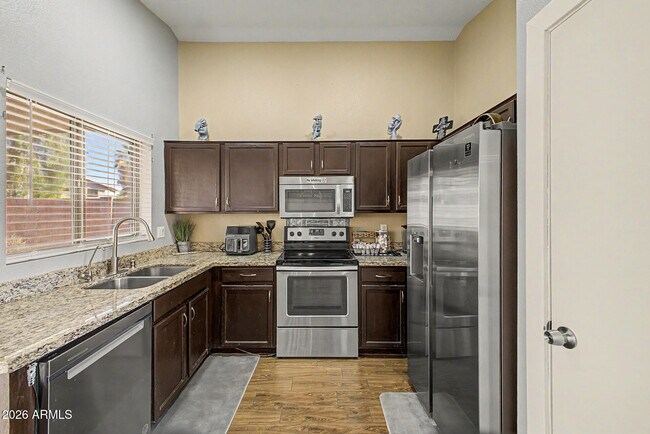 Building Photo - 3819 N 106th Ave