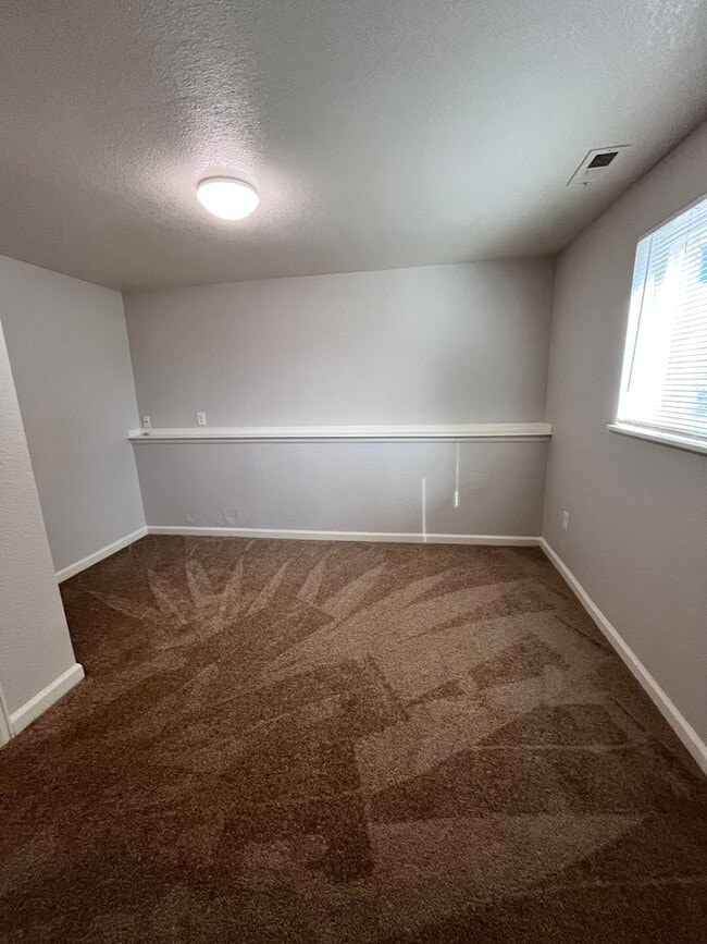 Building Photo - Welcome home to your updated 4-bedroom, 2 ...