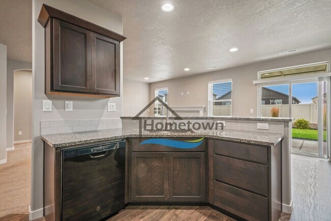 Building Photo - 3 Bedroom 2 Bath Home with 2-Car Attached ...