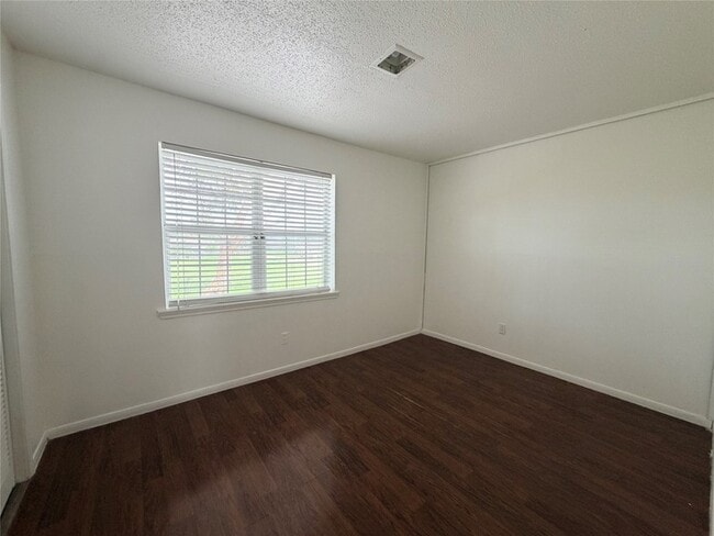 Building Photo - 7700 Creekbend Dr