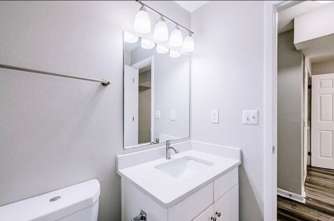 Building Photo - Spacious 2-Bedroom Elite Apartment with Private Balconies & Washer/Dryer