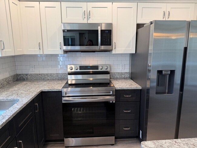 Building Photo - Leicester - Immaculate Three Bedroom with Huge Backyard