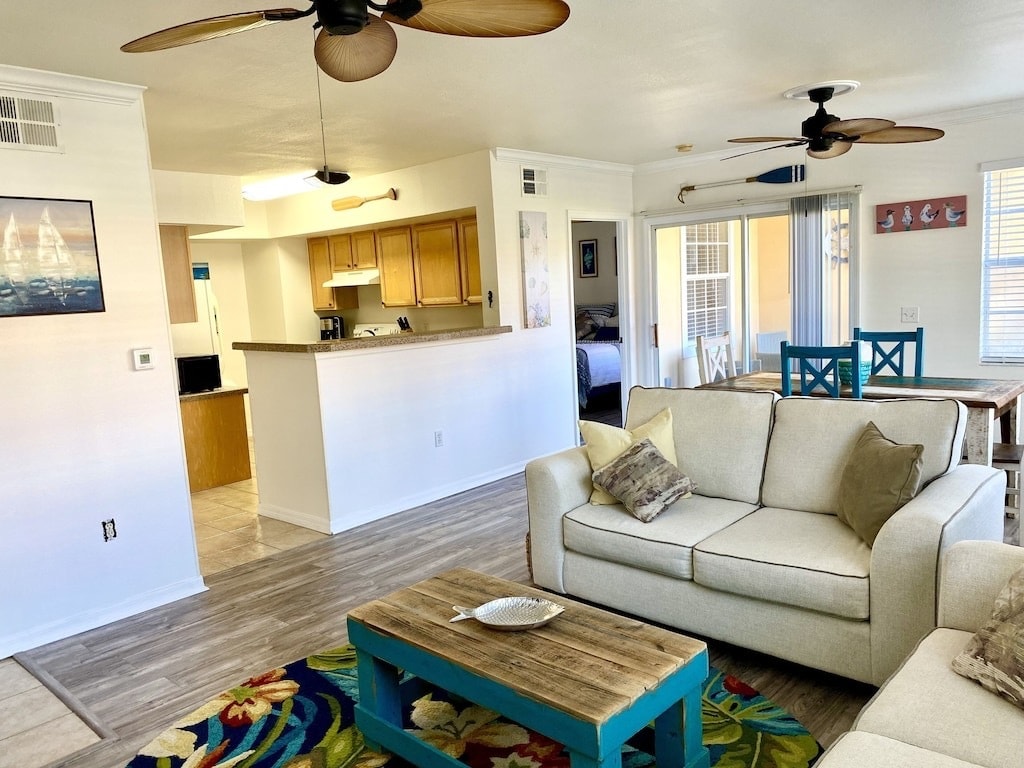 Kitchen opens to living and dining area - 1000 Villagio Cir