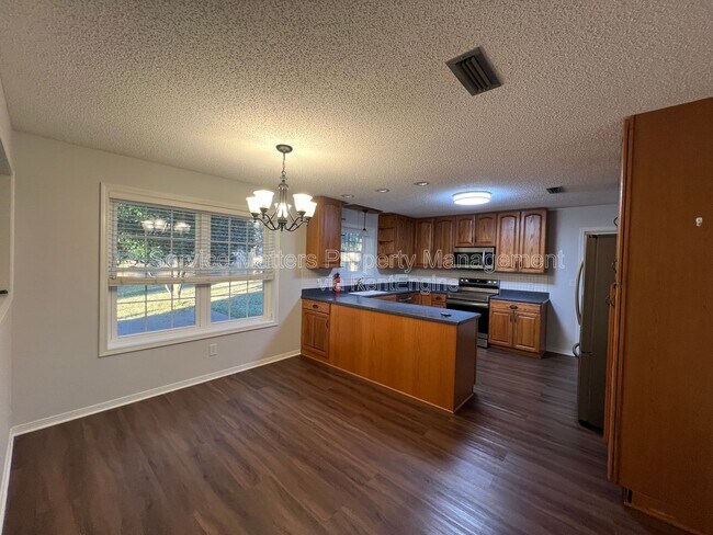 Building Photo - 6004 Players Pl