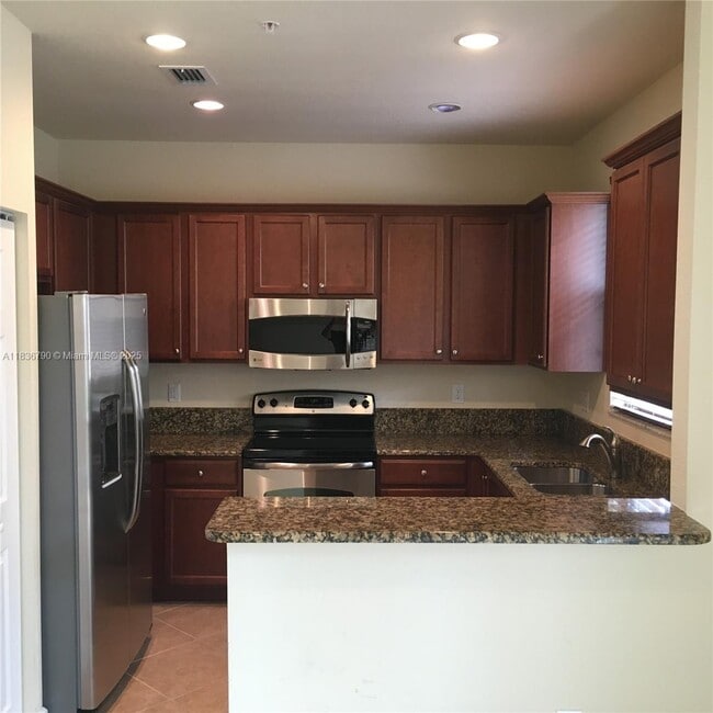 Building Photo - 12444 Emerald Creek Manor