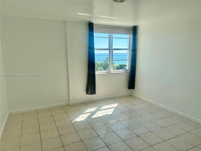 Building Photo - 6450 Collins Ave