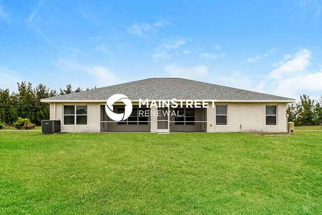 Building Photo - 4 Bedroom Pet-Friendly Home in Cape Coral, FL with Main Street Renewal