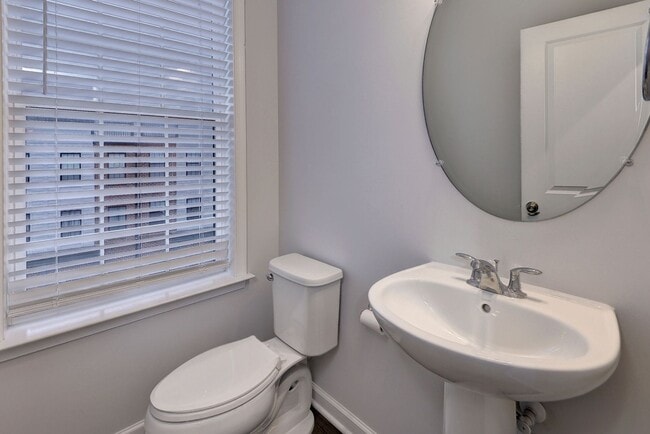 Building Photo - Three Story Brick End Unit with Rooftop Terrace