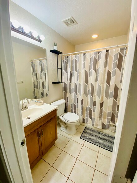 Guest Bath across from bedroom 3 - 6748 Trail Lake Dr
