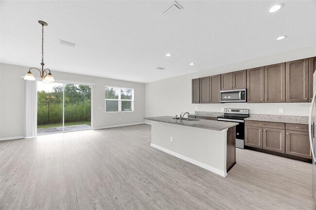 Building Photo - 6321 Tillandsia Pl