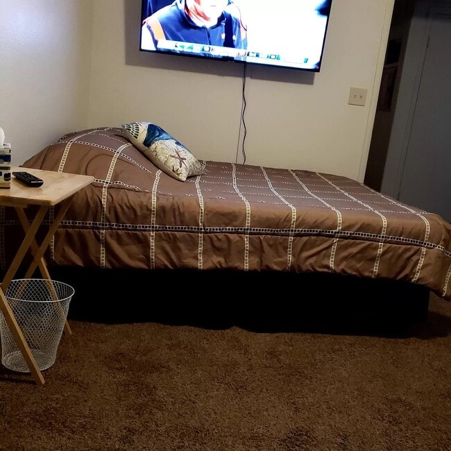 sofa view to Smart Samsung TV 2nd Bedroom - 5710 E Tropicana Ave