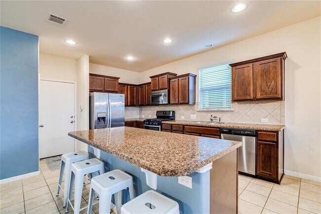 Building Photo - Four Bedroom Home Available for June Move-In!