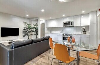 Building Photo - Tech Hub Living! This sleek 1 bed, 1 bath,...