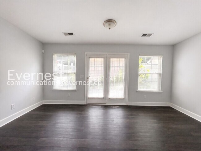 Building Photo - 2 Bed/2.5 Bath Townhome with Fenced Yard & Garage / Pet-Friendly / Available Now!