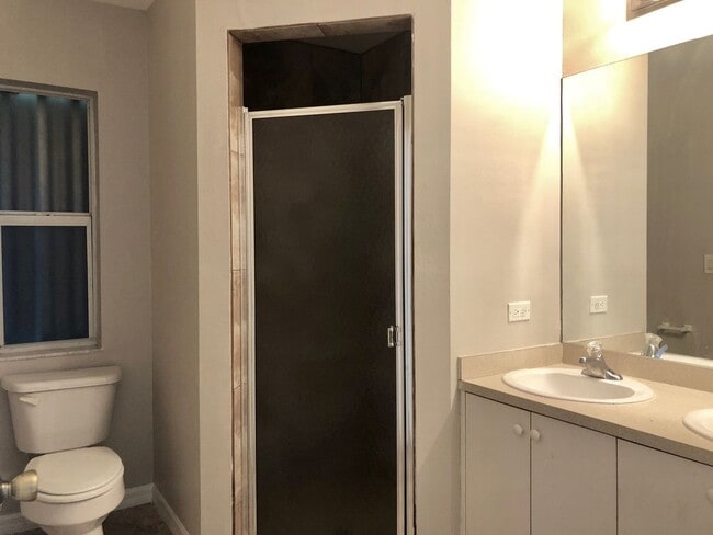 Building Photo - Experience this Large Cape Coral 3 bedroom 2 bath duplex with 1 car garage and screened in lanai.