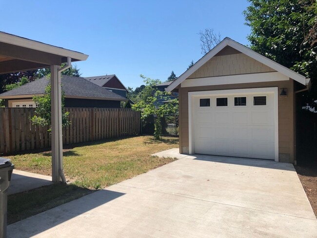 Building Photo - Beautiful New Home with Garage and Yard! A...
