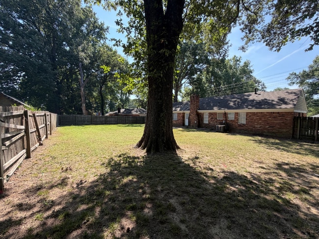 Building Photo - Charming 3BR/1.5BA Bartlett Area Home | Brick Fireplace, Tile Kitchen & Fenced Yard