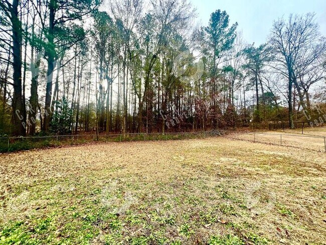 Building Photo - RENT JUST REDUCED!!! Exceptional value for a 3 Bedroom 2bath Fenced yard home close to Ft. Bragg